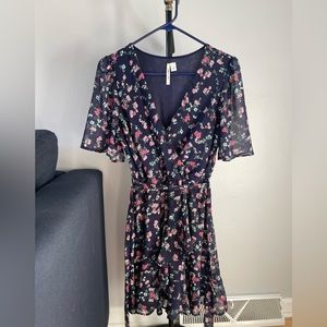Medium v-neck navy blue mini dress with pink floral pattern